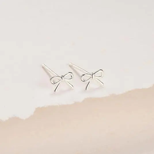 Lumina Grace Bow & Cross Studs – Light, Pure & Elegant